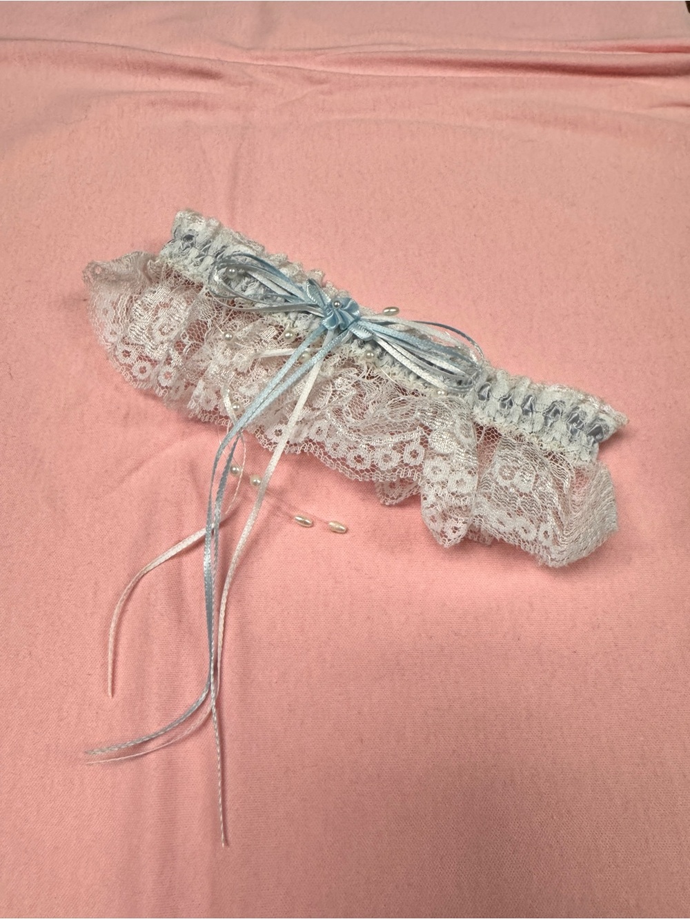 Delicate Lace Bridal Garter with Blue Ribbon Detail